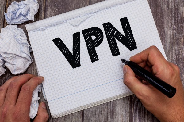 cyberghost vpn services review overview how good hand writing VPN with black marker on notebook